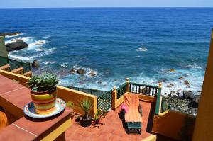 a balcony with a view of the ocean at Casa Rural Virgen del Rosario in San Juan de la Rambla