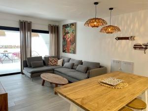 a living room with a couch and a table at Casa Domino in Villaverde