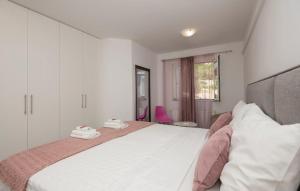 Postel nebo postele na pokoji v ubytování Apartment Kristina