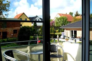 desde la ventana de un balcón con sillas en Ferienwohnung 105 Haus Katharina mit Balkon, en Lauterbach