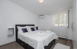 Postel nebo postele na pokoji v ubytování Apartment Kristina