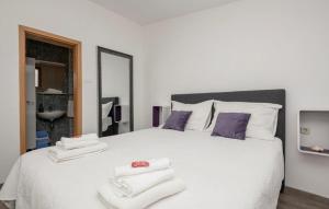Postel nebo postele na pokoji v ubytování Apartment Kristina