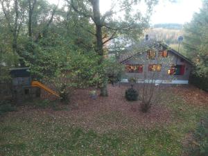 Fotografie z fotogalerie ubytování Gezellige familie chalet v destinaci Oizy