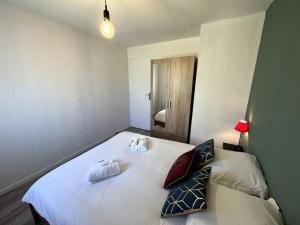 Łóżko lub łóżka w pokoju w obiekcie Auva - SILS Maison 48 m2 à 5 minutes à pied de la plage