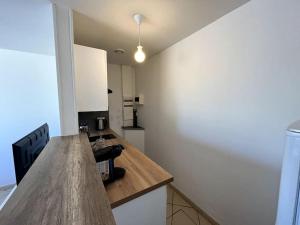 Kuchnia lub aneks kuchenny w obiekcie Auva - SILS Maison 48 m2 à 5 minutes à pied de la plage
