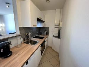 Kuchnia lub aneks kuchenny w obiekcie Auva - SILS Maison 48 m2 à 5 minutes à pied de la plage