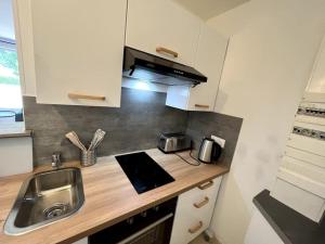 Kuchnia lub aneks kuchenny w obiekcie Auva - SILS Maison 48 m2 à 5 minutes à pied de la plage