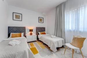 Posteľ alebo postele v izbe v ubytovaní Luxury Holiday House Tenerife