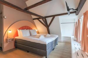 Postel nebo postele na pokoji v ubytování Hotel Halbert