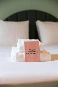Postel nebo postele na pokoji v ubytování Hotel Halbert