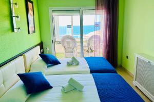Posteľ alebo postele v izbe v ubytovaní Home Rits Salou