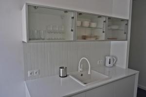Kuchyňa alebo kuchynka v ubytovaní Muralowy apartament Katowice Nikiszowiec