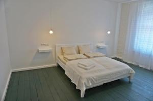 Posteľ alebo postele v izbe v ubytovaní Muralowy apartament Katowice Nikiszowiec