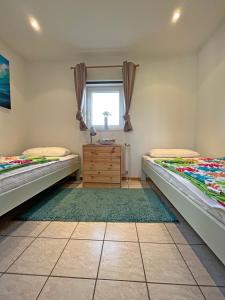 Krevet ili kreveti u jedinici u okviru objekta "Haus am Meer"Fewo 1 - a71225