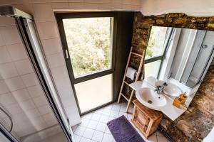 a bathroom with a sink and a window at Hallgarter Zange in Oestrich-Winkel