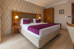 Xenon Hotel & SPA 객실 침대