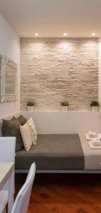 A seating area at DESIGN DISTRICT- NAVIGLI Mini Appartamento Via Tortona 66