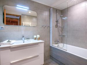 a bathroom with a sink and a shower at Charmant Appartement Montagnard au Coeur du Vieux Village, aux Pieds des Pistes de Val-d'Isère - FR-1-694-77 in Val dʼIsère +11 photos