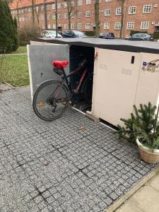 a bike sitting inside of a garage at Ferienwohnung Henny in Wismar