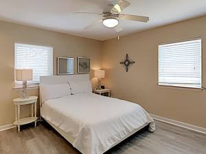 a bedroom with a bed and a ceiling fan at La Favorita in Navarre +30 photos