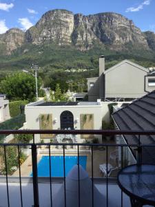 a view of a house with a mountain in the background at Anna's Place in Cape Town