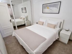 Ліжко або ліжка в номері Apartamento Brisas del Mar