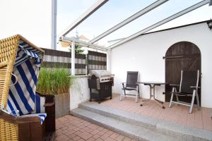 Ein Patio oder anderer Außenbereich in der Unterkunft Hamburg App. 01