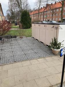 a parking lot with a bunch of stalls in a park at Fewo - Am Mühlenteich in Wismar