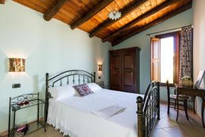 Postel nebo postele na pokoji v ubytování B&B Sa Specula IUN E4404