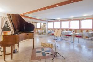 TV a/nebo společenská místnost v ubytování Hotel Delta Florence