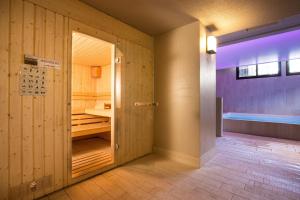 Ліжко або ліжка в номері SOWELL HOTELS Le Parc & Spa
