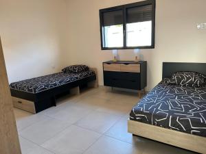 Posteľ alebo postele v izbe v ubytovaní Appartement sur le port