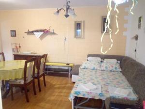 Posedenie v ubytovaní Apartmani Ćubela + 1 fotografia