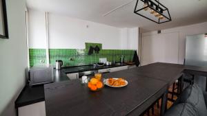 Kuchyňa alebo kuchynka v ubytovaní Wow Rooms