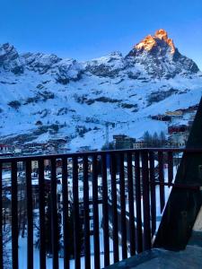 a view of a mountain with snow on it at Eagle's Nest in Breuil-Cervinia