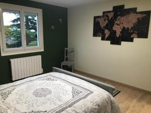 Posteľ alebo postele v izbe v ubytovaní Le Gîte Champenois