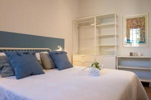 Postel nebo postele na pokoji v ubytování Suite Apartments - Corso51