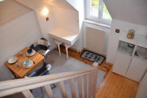 Kuchyňa alebo kuchynka v ubytovaní Petit duplex de charme sous les toits du Mont-Dore