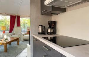 a kitchen with a coffee maker on the counter at Stunning Home In Chaam With Wifi in Chaam