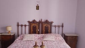A bed or beds in a room at Majella National Park La Casa Di Nonna Maria