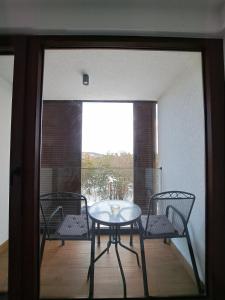 Un balcon sau o terasă la Divcibor 23