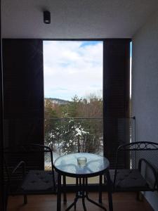 Un balcon sau o terasă la Divcibor 23