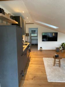 a kitchen with a sink and a counter top at Die Römer in Schwaigern