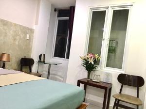 Posezení v ubytování SaiGon CoZy Hotel "241 Pham Ngu Lao Street''