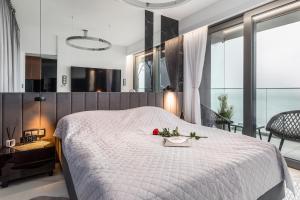 Posteľ alebo postele v izbe v ubytovaní Holiday Exclusive