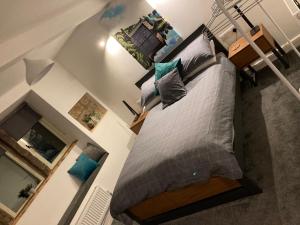 an overhead view of a bed in a room at Coiners Rest in Heptonstall