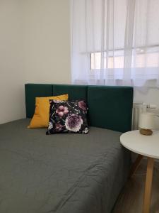 Posteľ alebo postele v izbe v ubytovaní Apartament z widokiem-Bliżej Zdroju
