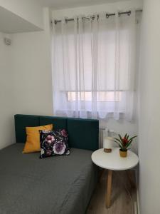 Posteľ alebo postele v izbe v ubytovaní Apartament z widokiem-Bliżej Zdroju