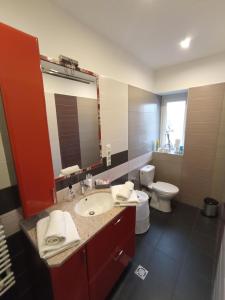 Kúpeľňa v ubytovaní Borostyán Apartmanház