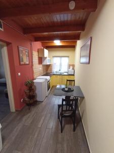 Kuchyňa alebo kuchynka v ubytovaní Borostyán Apartmanház